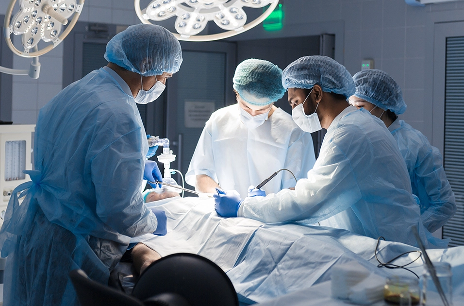 Corporate Partnerships - a team of surgeons perform an operation